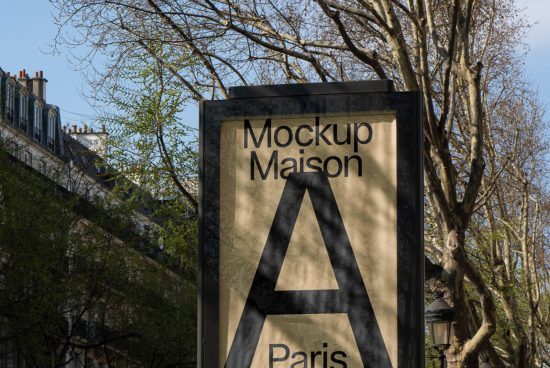 Outdoor billboard mockup on a Paris street with trees and buildings, showcasing elegant font design for branding and advertising.