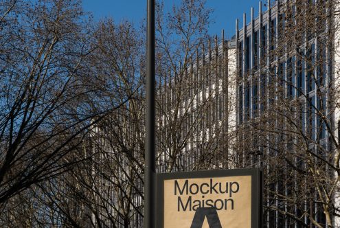 Outdoor signage mockup with clear sky for advertising and branding design in urban setting, suitable for designers' presentations.