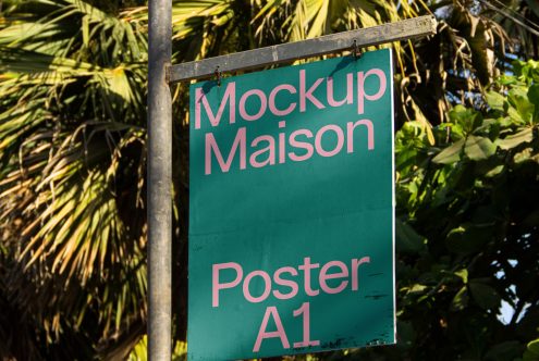 Outdoor mockup sign with tropical foliage background, showcasing Poster A1 design for advertising and branding for designers.