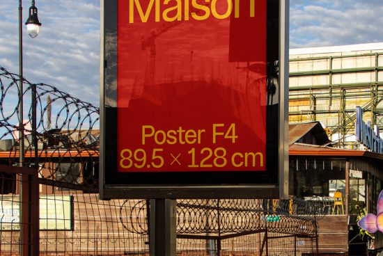 Outdoor advertising mockup featuring a large red poster with text and transparent construction site background, measuring 89.5 x 128 cm.