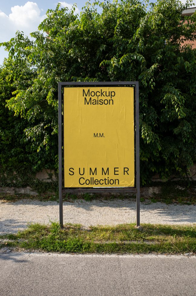 Outdoor billboard mockup in a natural setting for advertising design, showcasing summer collection graphics on a yellow background.