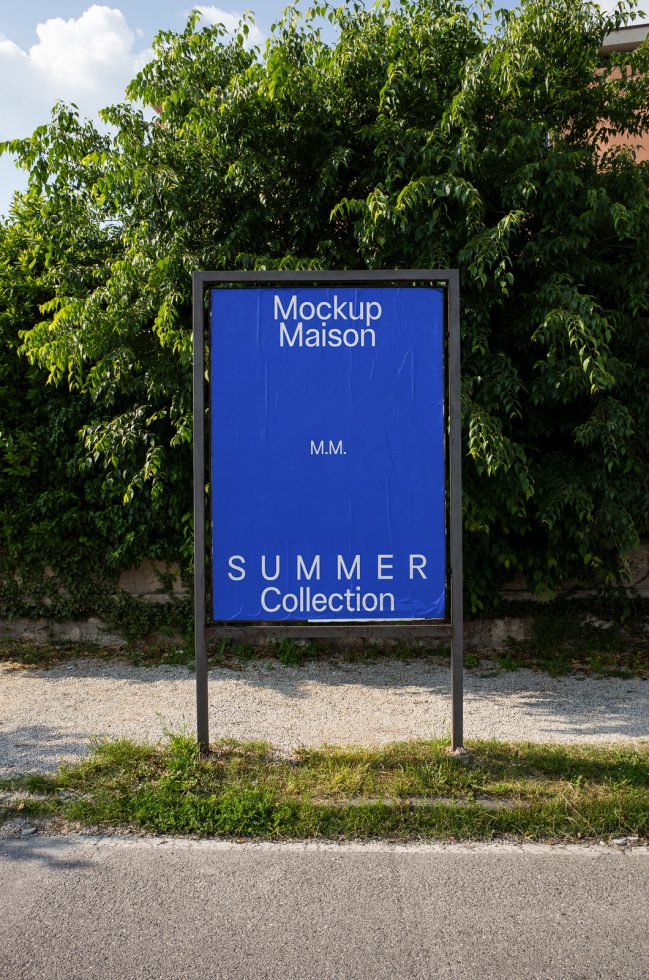 Outdoor billboard mockup with blue background and Summer Collection text displayed in a natural setting, perfect for designers' mockup projects.