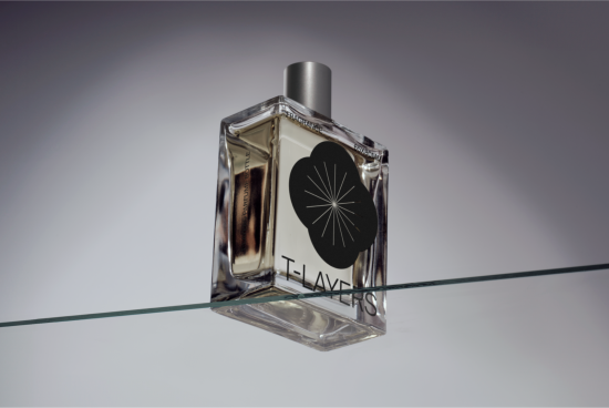 Elegant perfume bottle mockup on a glass surface for product design showcasing, with reflection, fragrance branding, realistic.