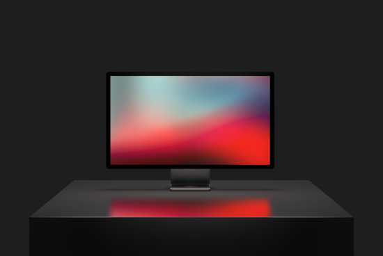 Professional monitor mockup on a sleek desk against a dark backdrop, displaying vibrant gradient wallpaper, ideal for showcasing designs.