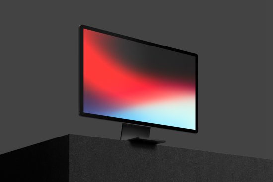 Modern computer monitor mockup with colorful screen on dark background, ideal for website design presentations and digital product display.