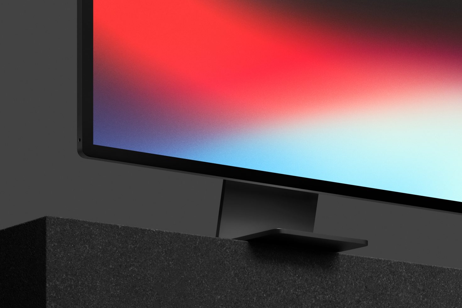 Monitor on stand displaying vibrant gradient wallpaper, ideal for graphics or template design use by creative professionals.