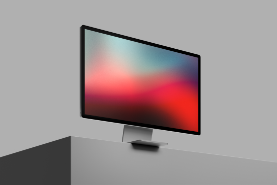 Modern computer monitor mockup with colorful abstract wallpaper, ideal for showcasing user interface, website, and app designs.