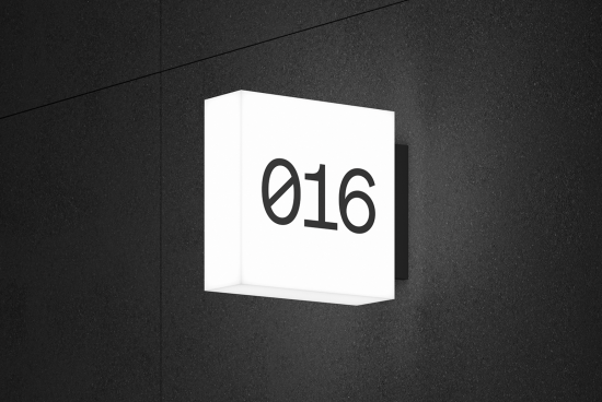 Minimalist 3D lightbox mockup with bold numerals on a textured wall, ideal for presentations and showcasing font designs.