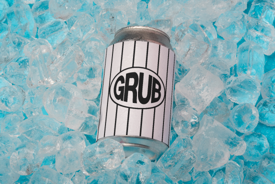 Soda can with 'GRUB' label mockup surrounded by ice, product design presentation, graphic design asset, ideal for branding projects.