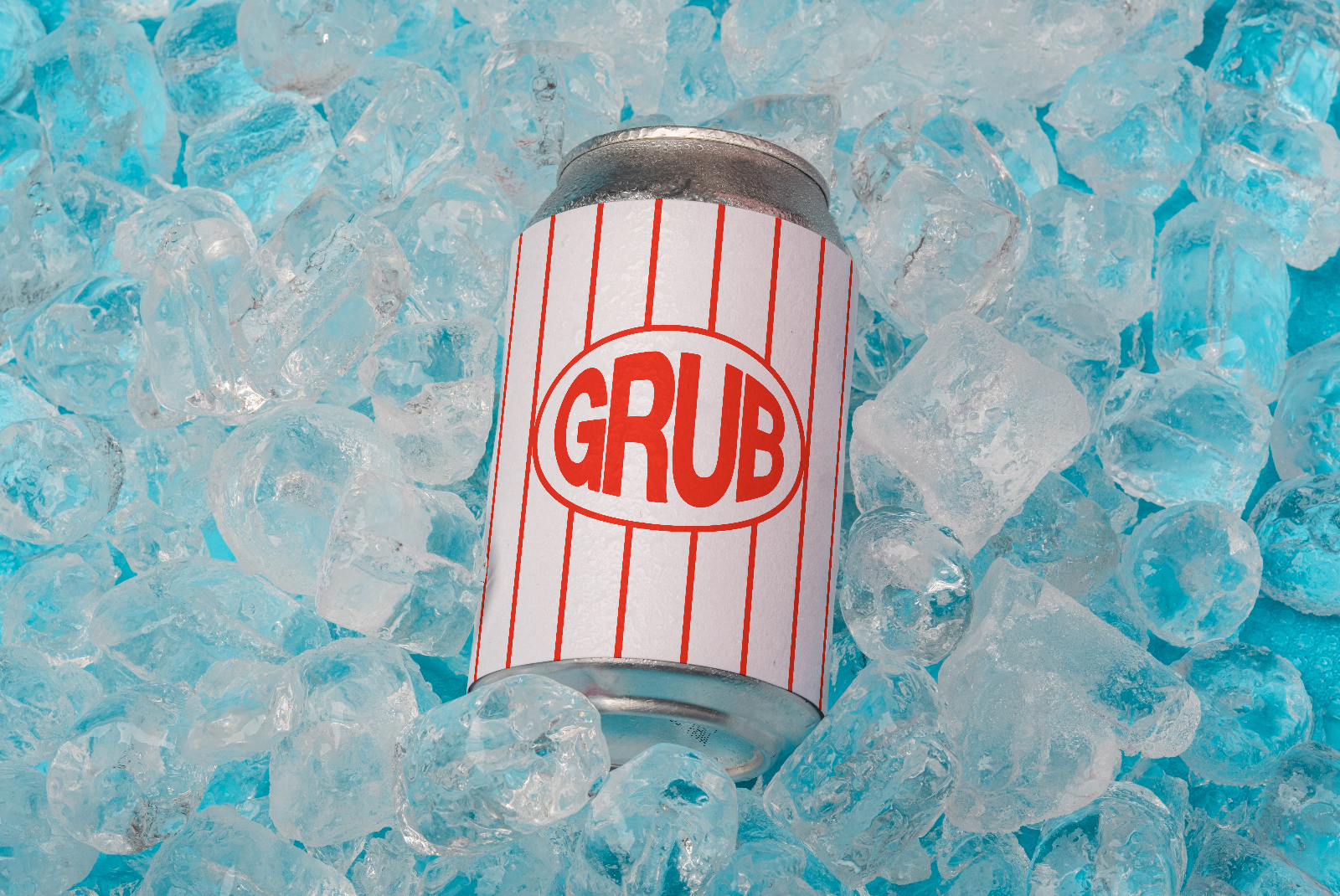 Drink can mockup with retro branding on a bed of ice cubes, ideal for presentations in graphics and template designs for product showcases.