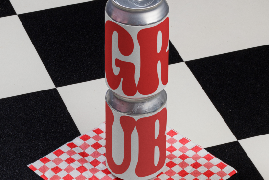 Two stacked soda cans with red and white design on checkered background, ideal for graphic design mockups and advertising templates.