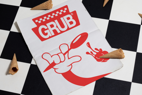 Creative fast-food packaging mockup with playful graphics on a checkered background scattered with waffle cones, ideal for restaurant branding design.