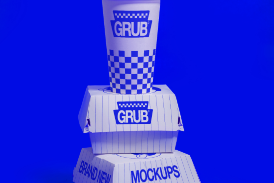Stacked food packaging mockups with burger box and drink cup featuring branding against a blue background, ideal for design presentation.