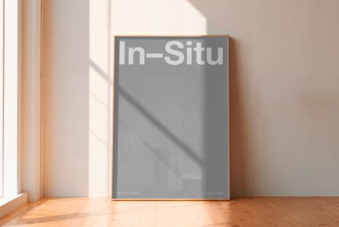 Realistic poster frame mockup in a sunny interior for showcasing designs. Clean, modern template with wood floors for graphic designers.