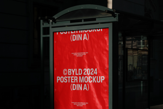 Outdoor poster mockup on bus stop shelter with red background and white text, designer resource, visible in natural environment for advertising.