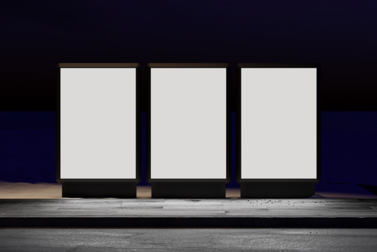 Three vertical billboard mockups at night for outdoor advertising, blank screens for design presentation, digital asset for graphic designers.