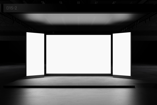 Empty exhibition stand with glowing white panels in a dark hall, perfect for design mockups and presentations.