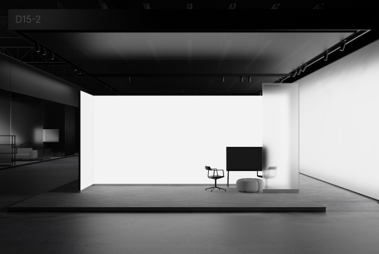 Minimalist exhibition stand mockup in a dark gallery space with spotlights, featuring an empty display wall, modern furniture, and clean design.