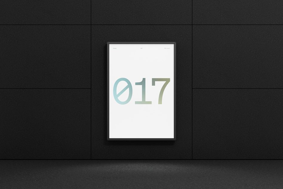 Minimalist poster mockup in a black frame on a dark wall, showcasing clean design for presentations and portfolio displays.