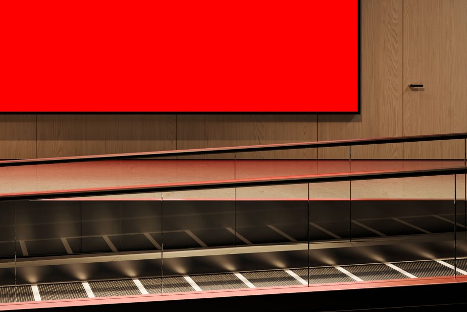 Minimalist interior design mockup with vibrant red wall, glass railing, and wood accents ideal for presentation and portfolio use.