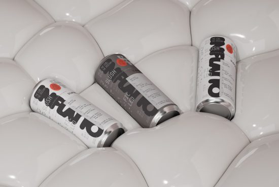 Three beverage cans in a white bubble wrap setting, showcasing modern packaging design mockup for branding graphics.