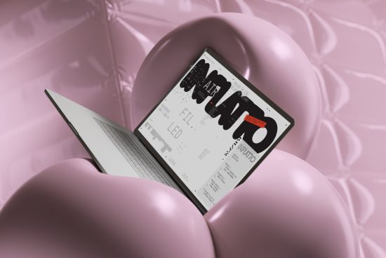 Laptop with graphic design mockup on pink balloon background, showcasing modern font and layout, perfect for designers' digital asset needs.