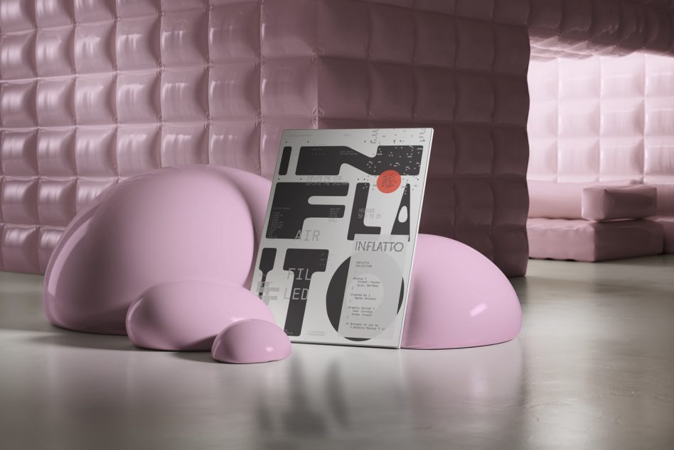 Pink inflatable spheres with geometric design poster leaning against them
