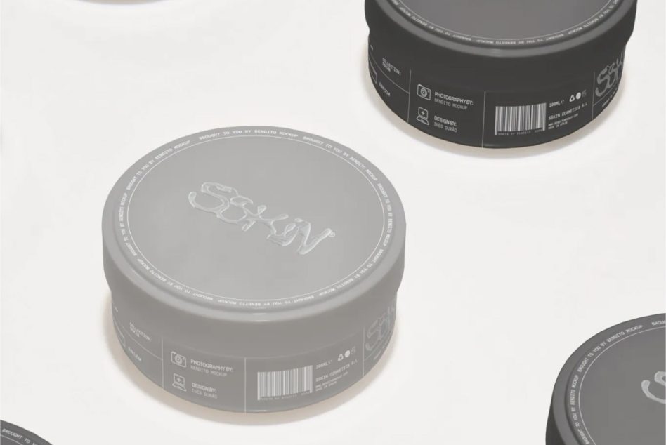 Gray cosmetic jar positioned at angle displaying full label design layout