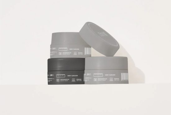Cosmetic cream jar mockup set with gray lids, perfect for beauty product packaging design presentations and branding projects in mockup category.