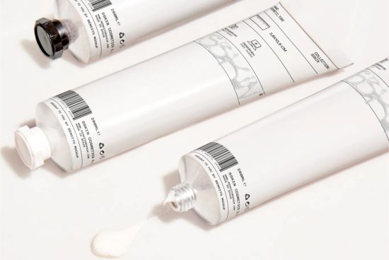 Cosmetic tube packaging mockup with cream texture, white clean design for beauty product branding presentations.