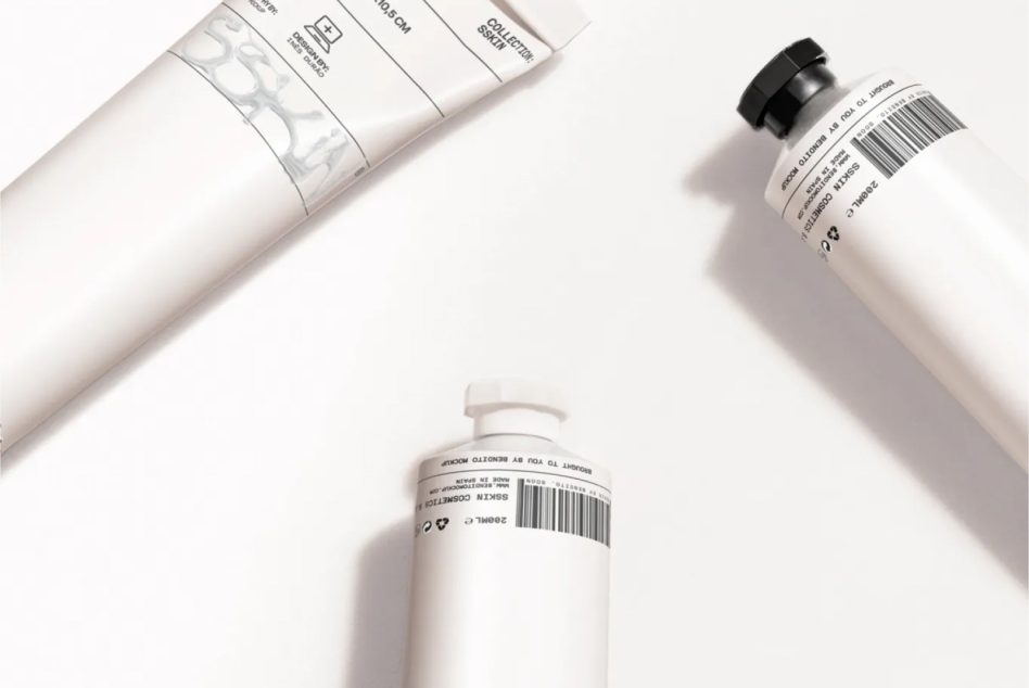 Minimal cosmetic collection showing white tubes, gray bottles with shadow detail