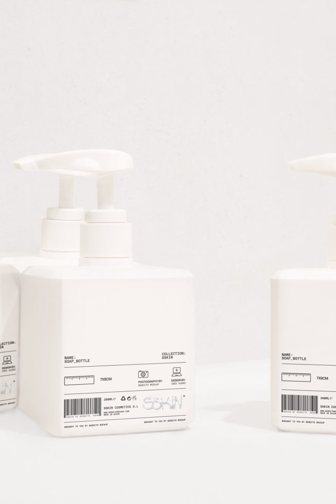 White pump bottles on a light background for product packaging mockup design, minimal style, perfect for cosmetics and skincare products ads.