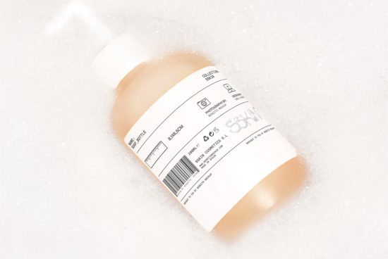 Cosmetic bottle label mockup in a bubbly bath setup, showcasing packaging design for beauty and skincare products, ideal for designer portfolio.