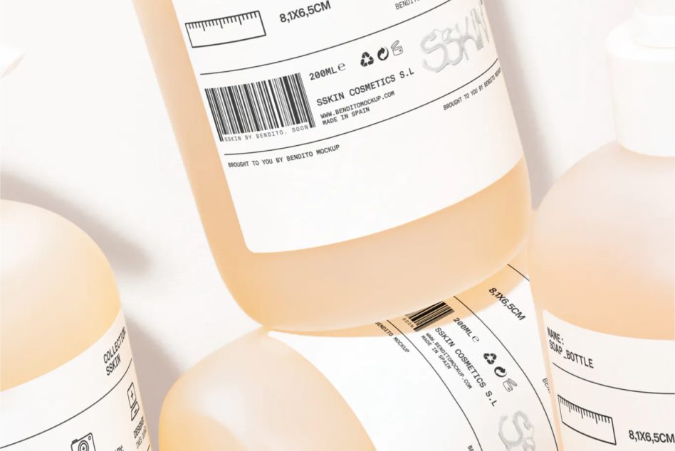 Peach bottle label detail with barcode, cosmetics branding, surrounding bottles