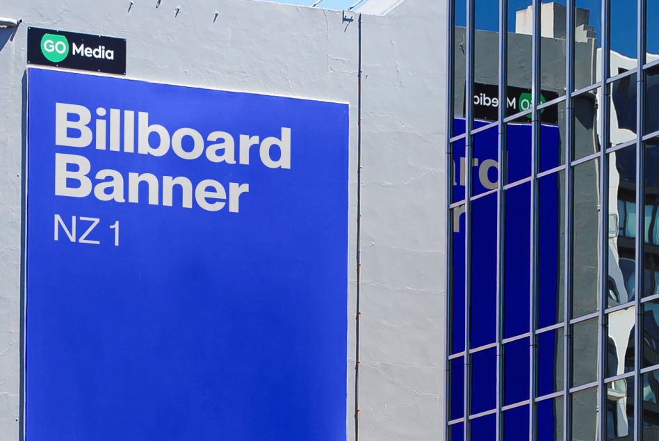 Outdoor billboard mockup on a bright sunny day for designers' advertising presentations, featuring clear blue banner space.