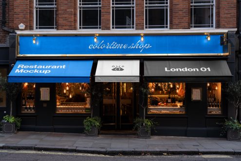 Stylish restaurant facade mockup at twilight, showcasing awnings with editable design, perfect for presentations and storefront design.