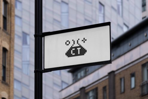 Pixel art signboard mockup with urban background for graphic design projects, suitable for designers looking for cityscape templates.