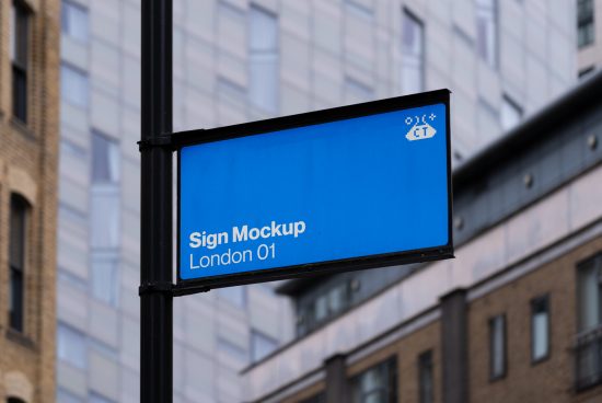 Blue street sign mockup on a pole with clear text space, urban London backdrop, perfect for designers to display branding graphics.