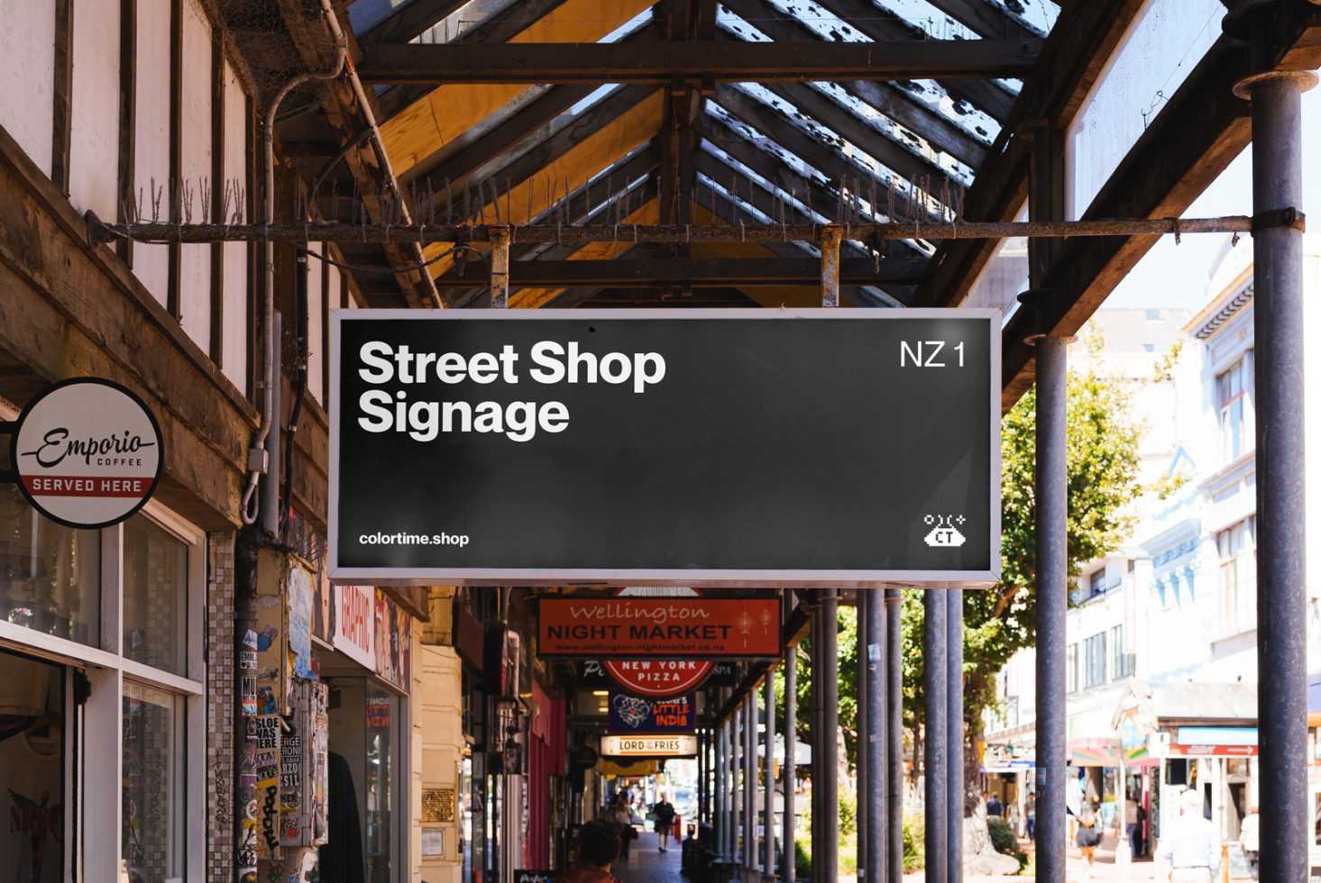 Urban street view with mockup of a hanging shop sign for showcasing branding designs in a realistic outdoor setting suitable for designers.