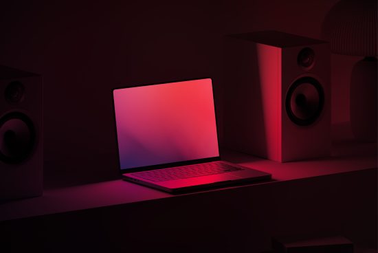 Laptop on desk with moody lighting for mockup, surrounded by speakers, aesthetic room setup, ideal for device display graphics.