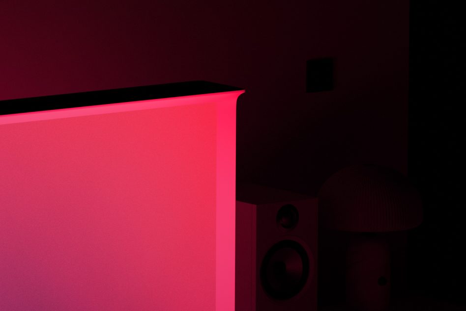 Neon pink wall catching dramatic side lighting against dark moody background with speaker silhouette