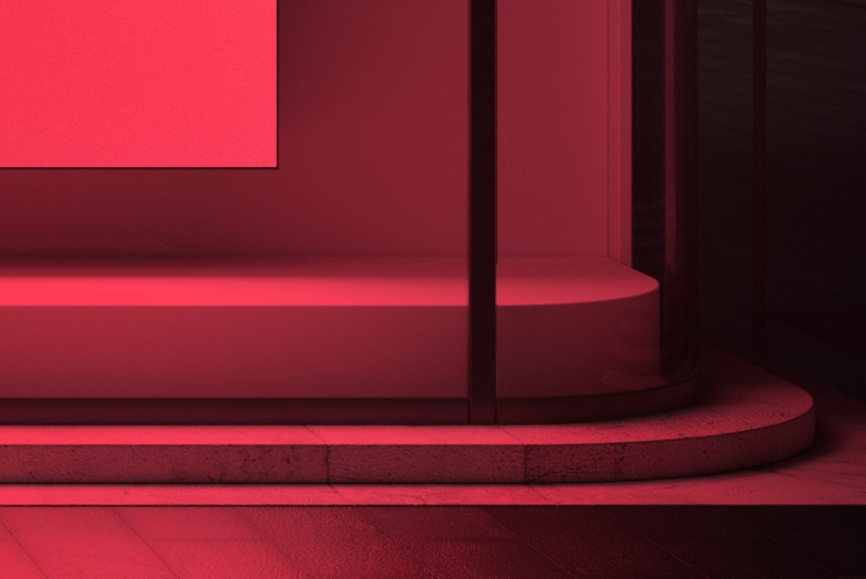 Bright coral neon wall segment with curved glass partition against dark space