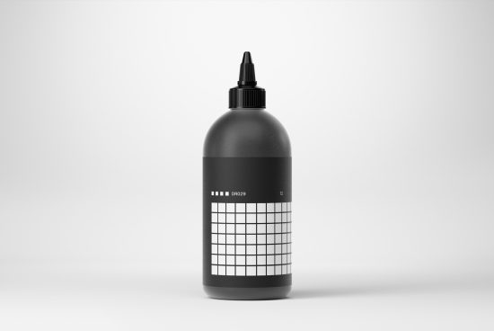Realistic mockup of a black squeeze bottle with a grid design label on a neutral background, ideal for branding presentations and product design.