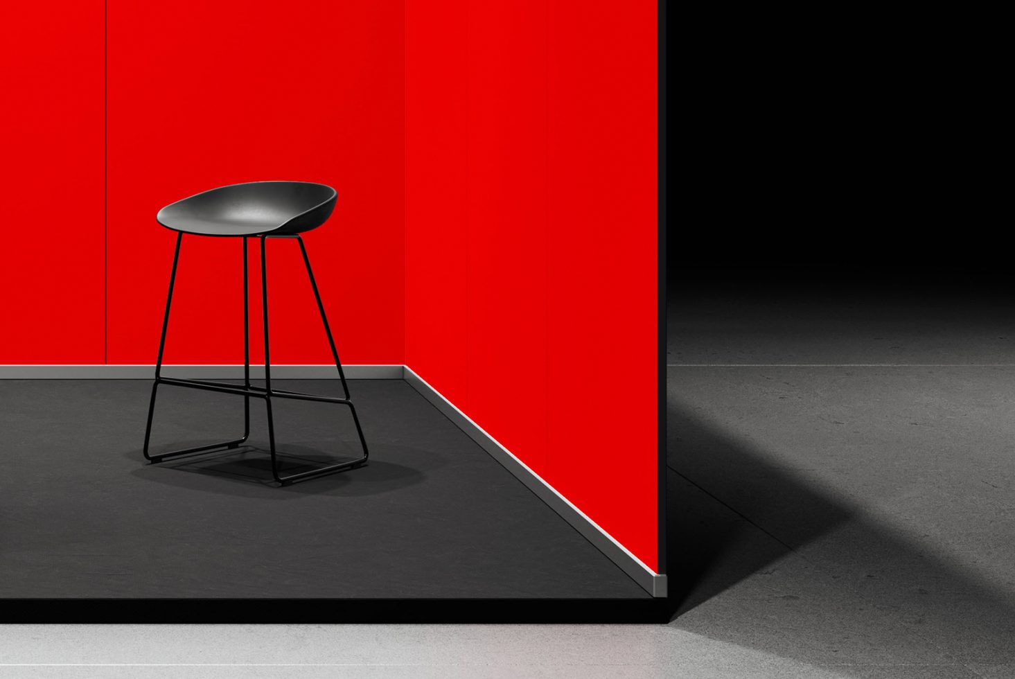 Modern minimalist stool with black frame against vibrant red wall in a stylish interior setup, perfect for mockup background.