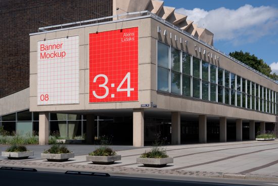 Urban banner mockup displayed on a building exterior for advertising design presentation, featuring a clear day and modern architecture.