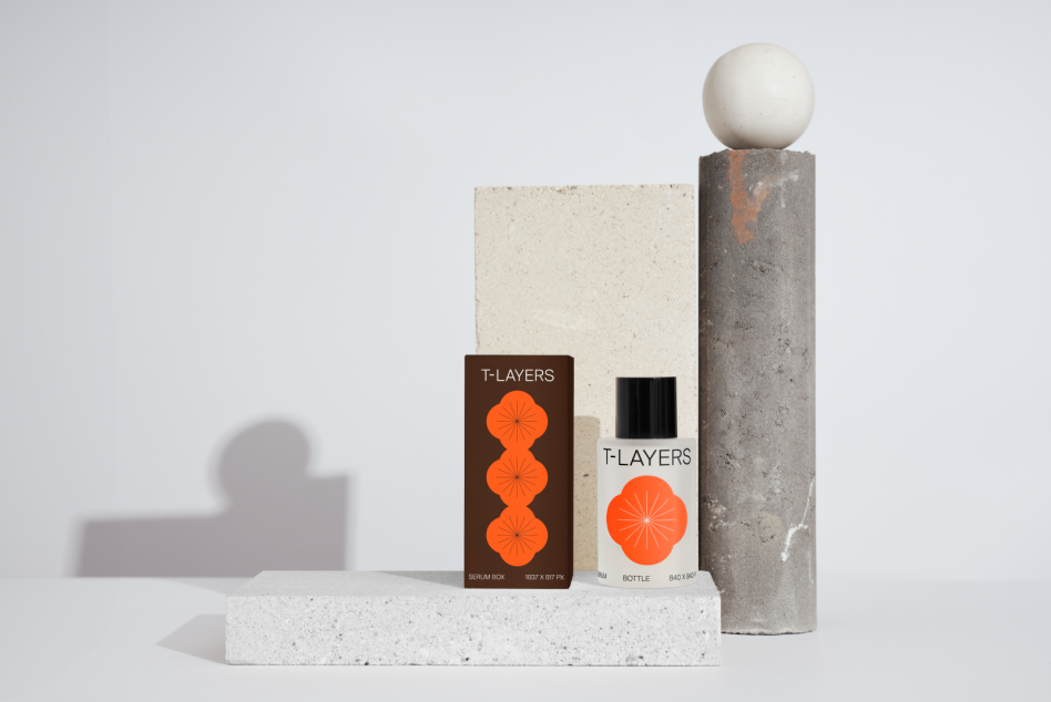 Modern cosmetic packaging mockup with concrete elements and a geometric design, ideal for presentations and portfolio.