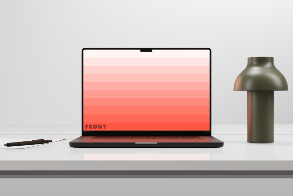 Laptop mockup on desk with gradient screen design and modern lamp, pen tool beside, ideal for presentations and digital designs.