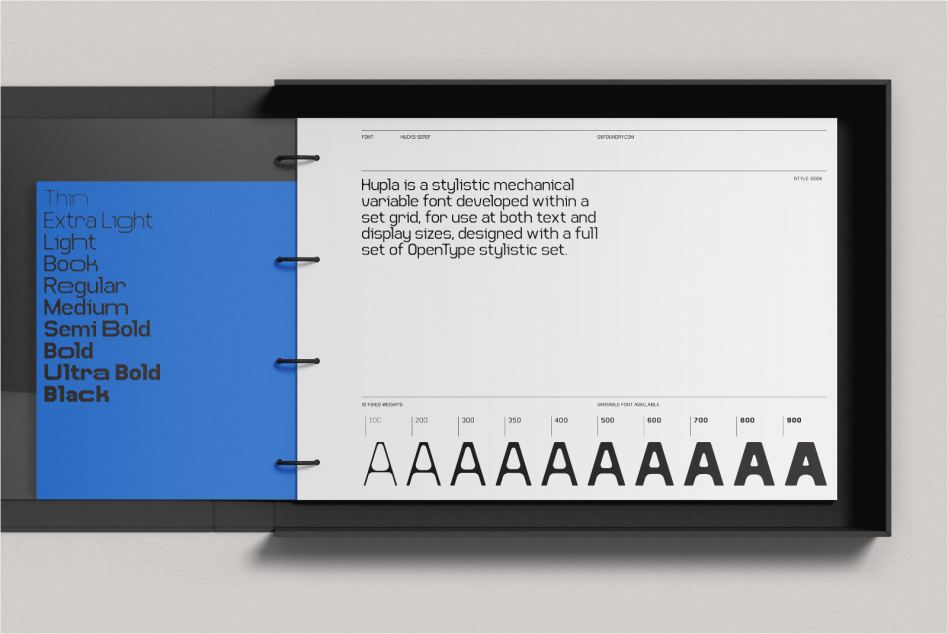 Font presentation mockup on binder with typeface samples showing different weights from thin to black, ideal for showcasing font designs.