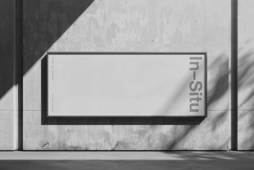 Minimalist poster mockup on concrete wall with shadows for graphic designers, clean urban presentation template, modern display.