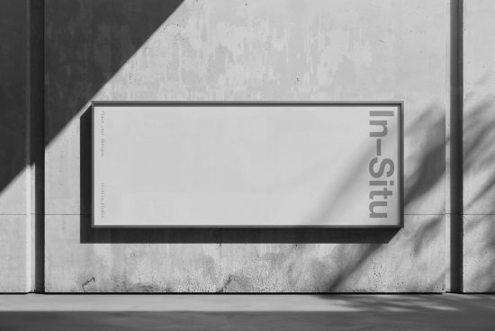 Minimalist poster mockup on concrete wall with shadows for graphic designers, clean urban presentation template, modern display.